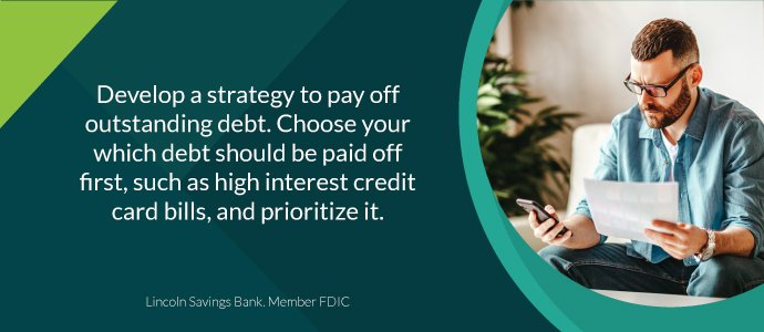 Create a strategy to pay off debt
